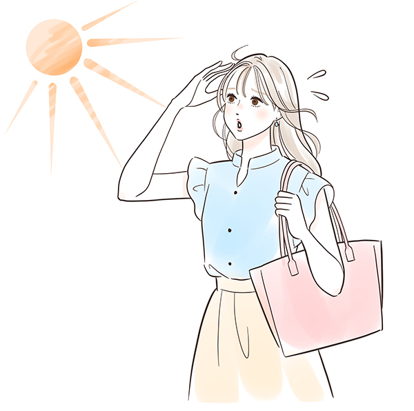 太陽をさける女性のイメージ